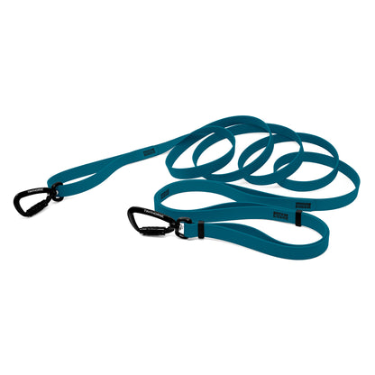 A aquamarine bio thane infinite pro dog leash with two auto-locking carabiners on a white background.