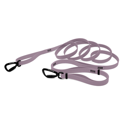 A lavender bio thane infinite pro dog leash with two auto-locking carabiners on a white background.