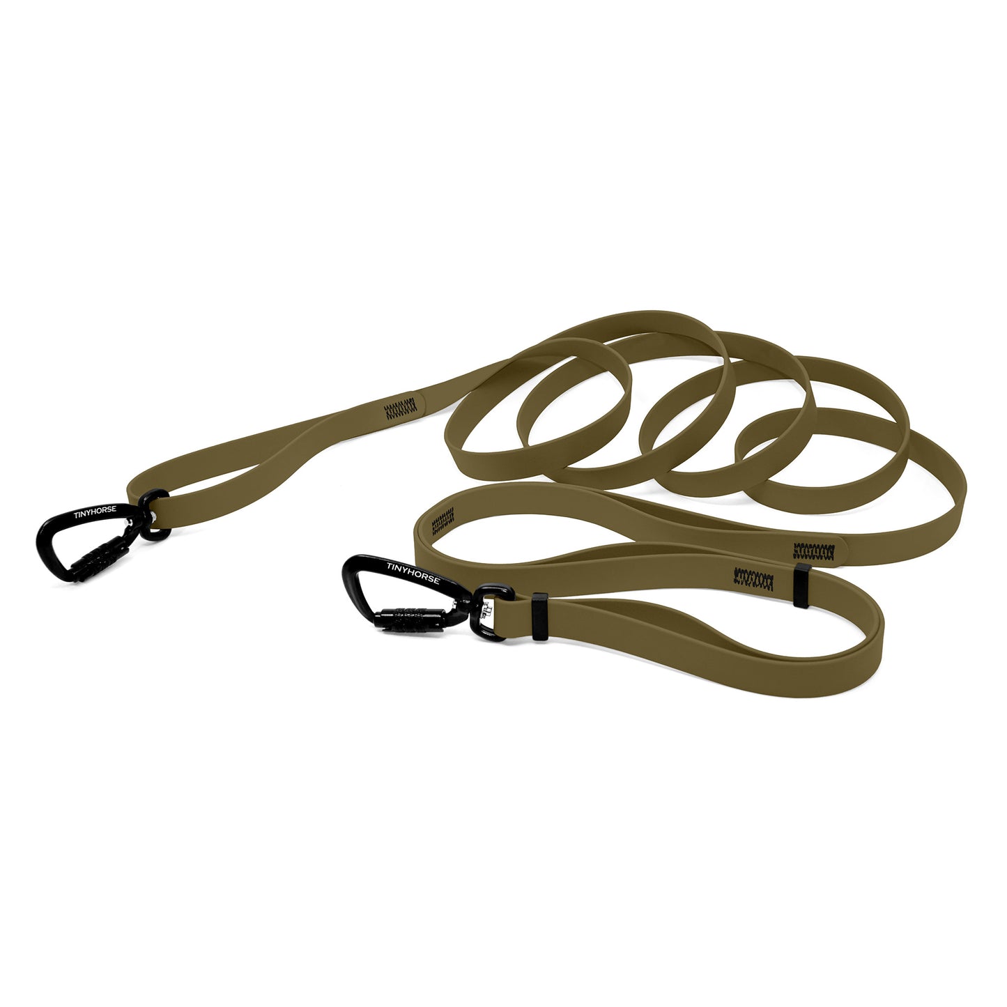 A sahara tan bio thane infinite pro dog leash with two auto-locking carabiners on a white background.