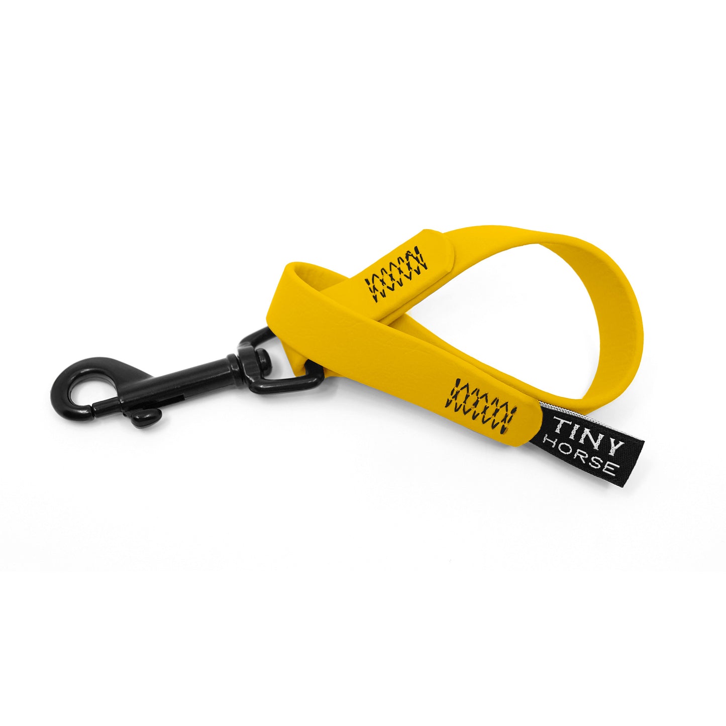 A canary yellow keeper in bio thane with a black trigger clip on a white background.