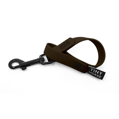 A dark brown keeper in bio thane with a black trigger clip on a white background.