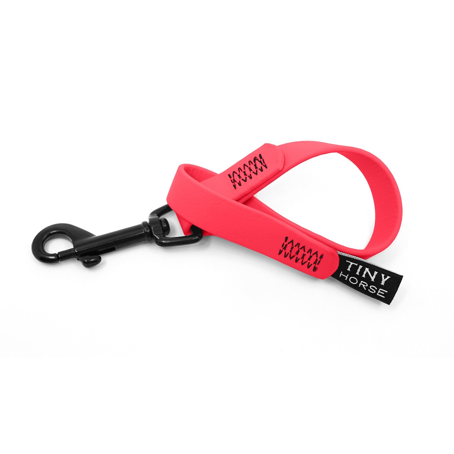 A neon pink keeper in bio thane with a black trigger clip on a white background.