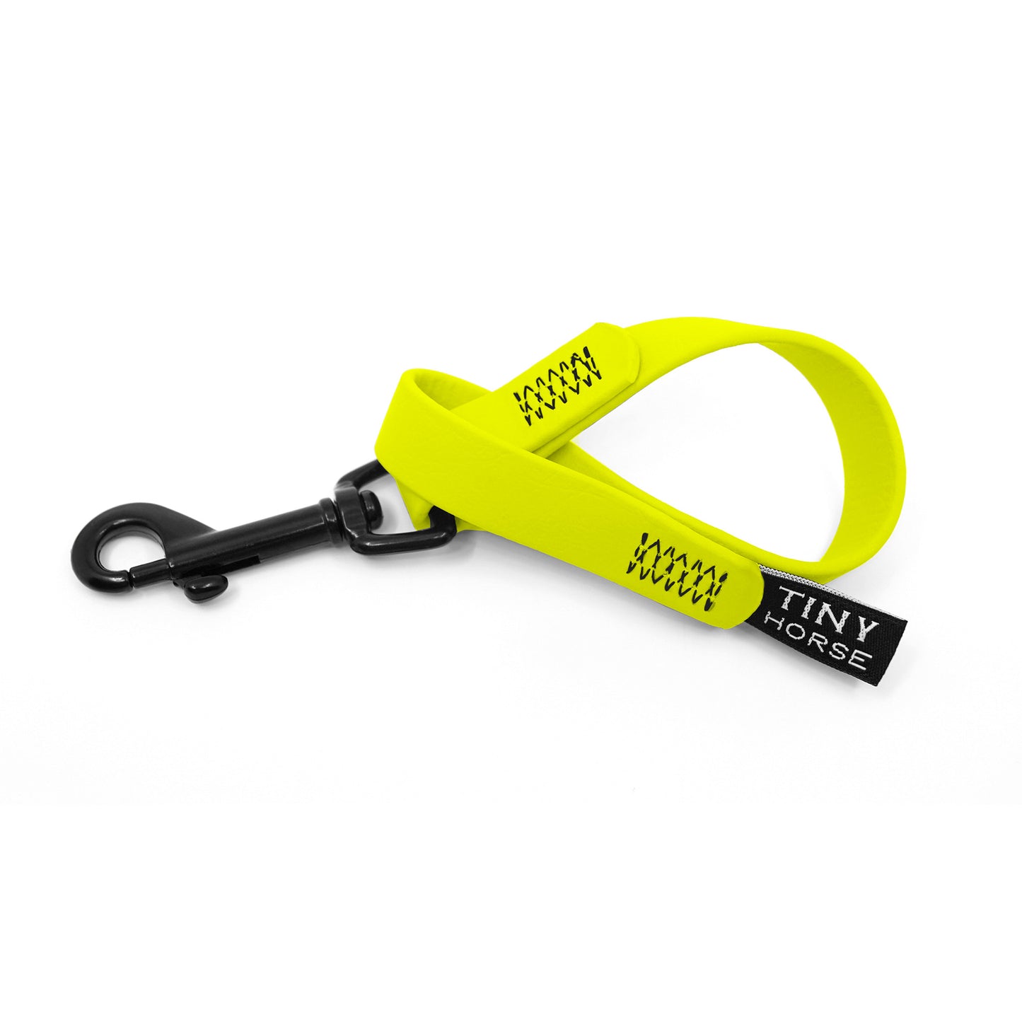 A neon yellow keeper in bio thane with a black trigger clip on a white background.