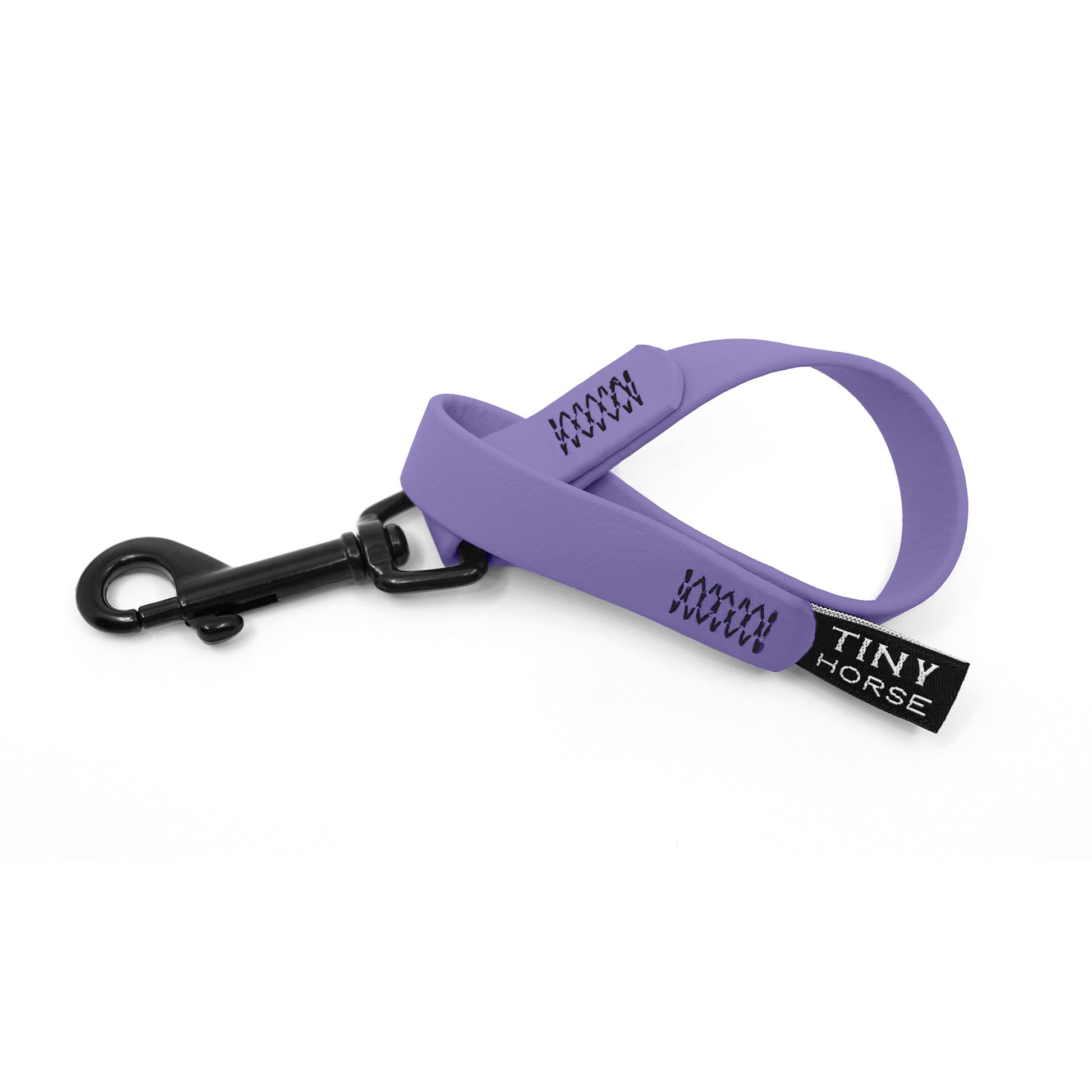 A periwinkle keeper in bio thane with a black trigger clip on a white background.