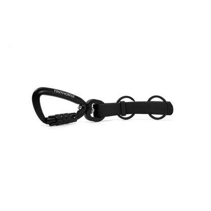 A black key chain with an auto-locking carabiner and two split rings on a white background.