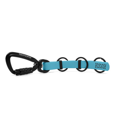 A extra long baby blue key chain with an auto-locking carabiner and three split rings on a white background.