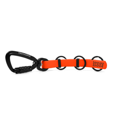 A extra long neon orange key chain with an auto-locking carabiner and three split rings on a white background.