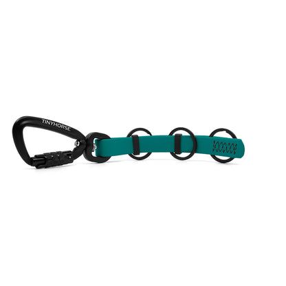 A extra long teal key chain with an auto-locking carabiner and three split rings on a white background.