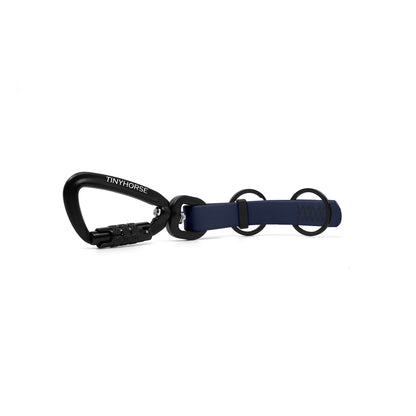 A navy blue key chain with an auto-locking carabiner and two split rings on a white background.
