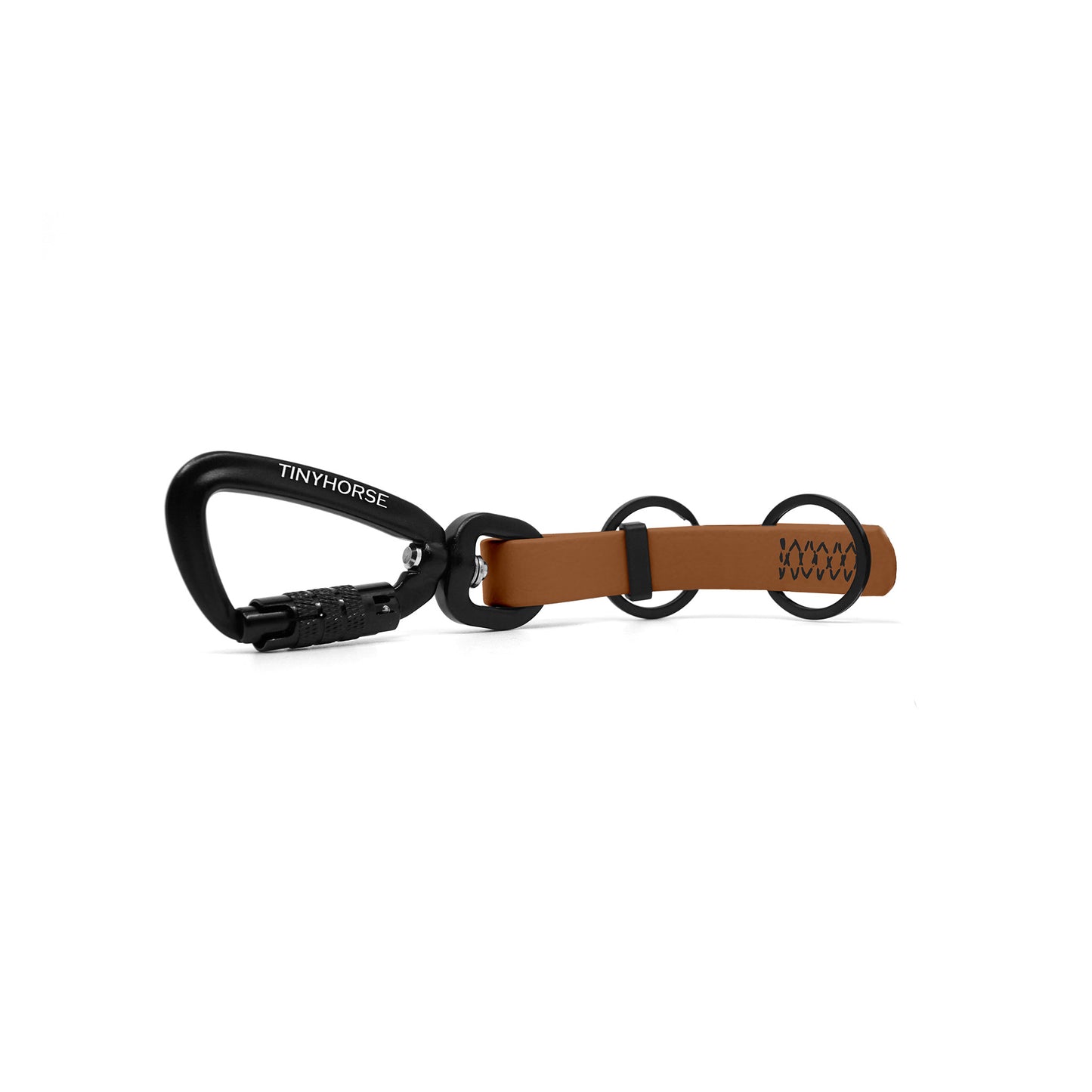 A tan key chain with an auto-locking carabiner and two split rings on a white background.