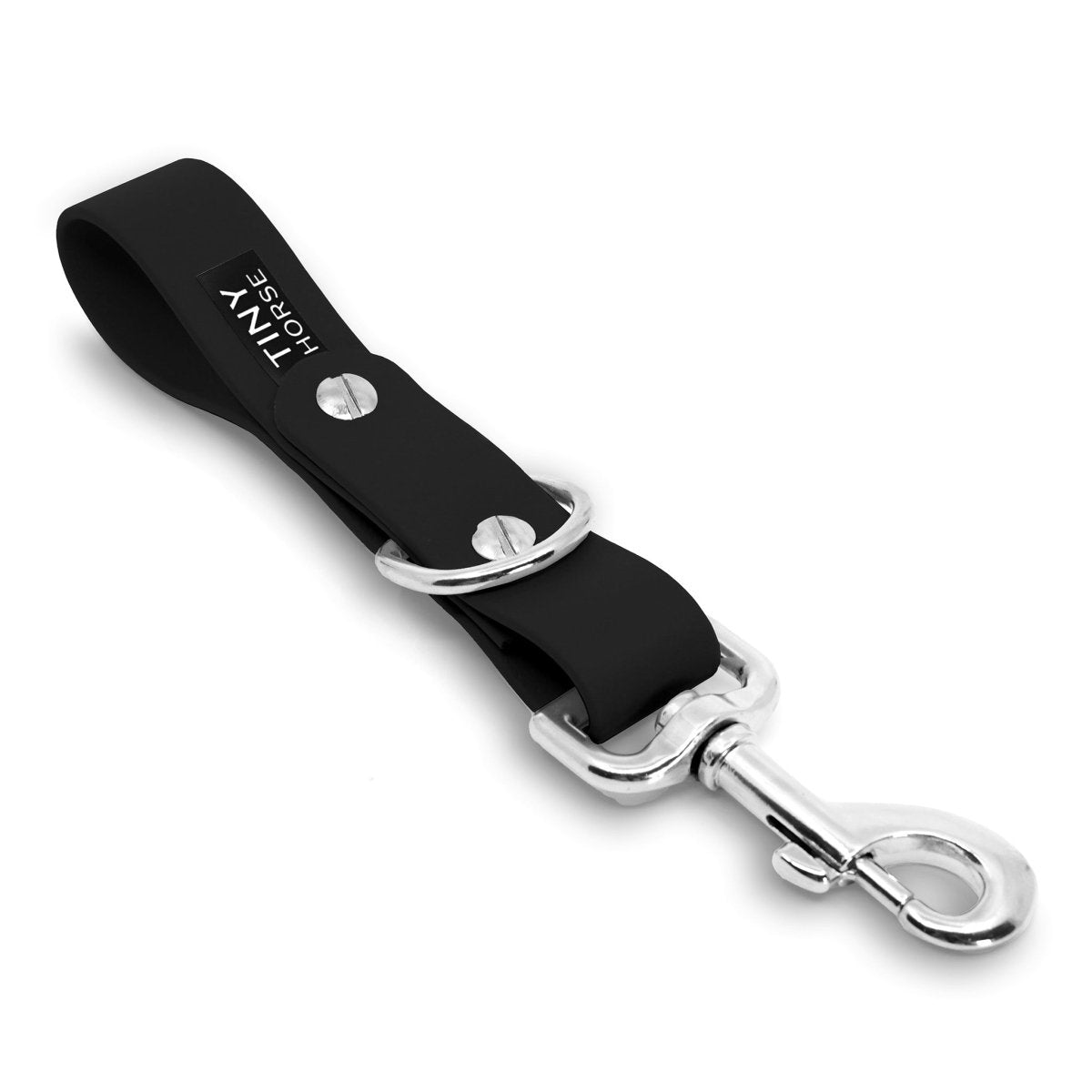A black Sidekick Hands free dog walking attachment with silver trigger clip on a white background.