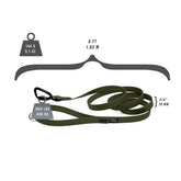 Olive dog leash with a black auto-locking carabiner clip on a white background. There are figures stating the leash’s specs. They are as follows: it weighs 144 grams or 5.1 ounces; its length is 6 feet or 1.83 meters; the clip has a break strength of 900 pounds or 408 kilograms; the leash strapping is 3/4” or 19 millimetres wiide.