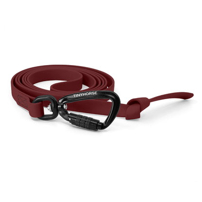 A burgundy step line in bio thane with auto-locking carabiner on a white background.