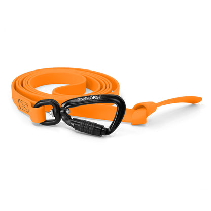 A pastel orange step line in bio thane with auto-locking carabiner on a white background.