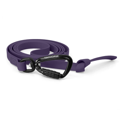 A purple step line in bio thane with auto-locking carabiner on a white background.